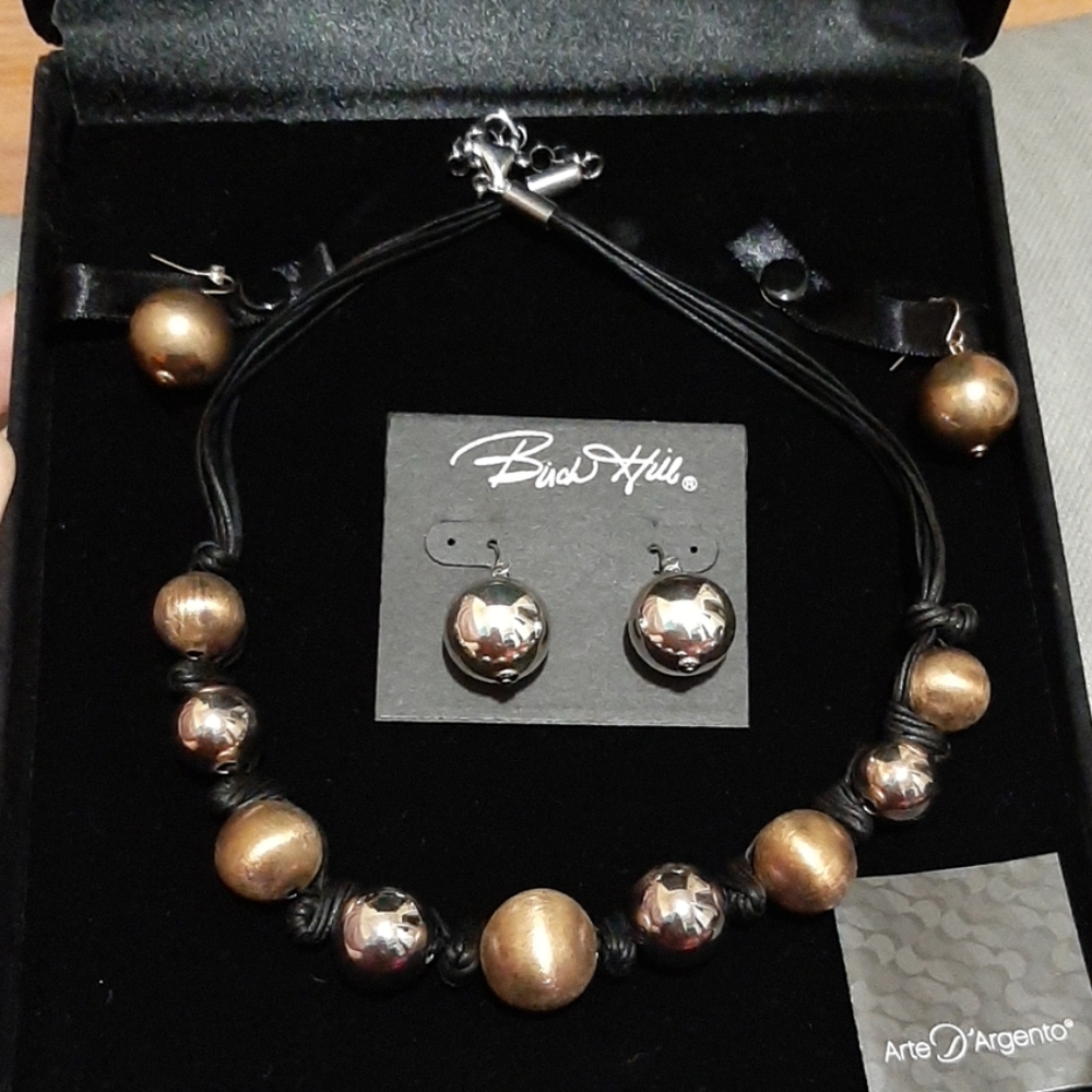 Women necklace and two sets of earrings